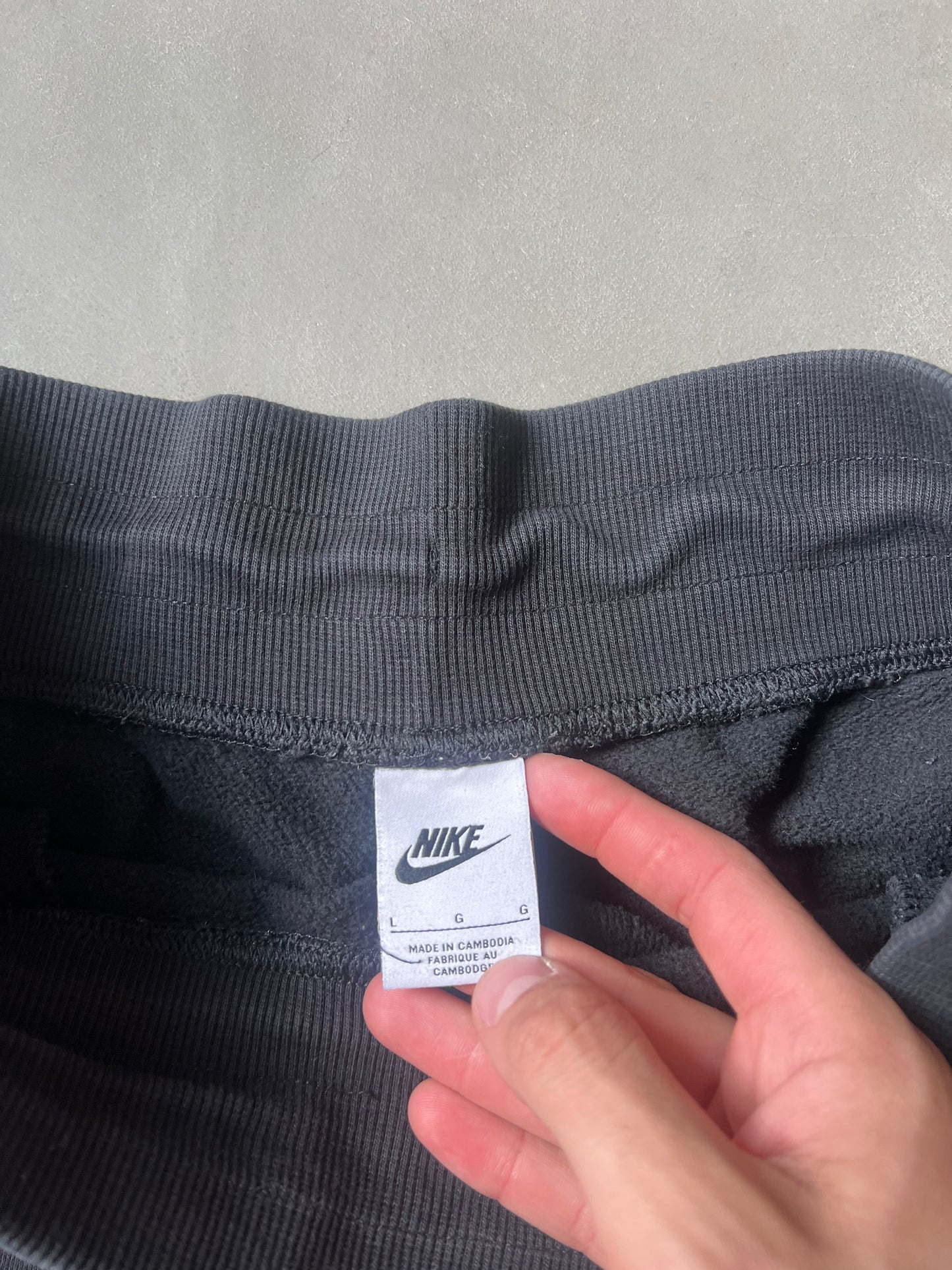 Vintage Black Nike Swoosh Shorts - L