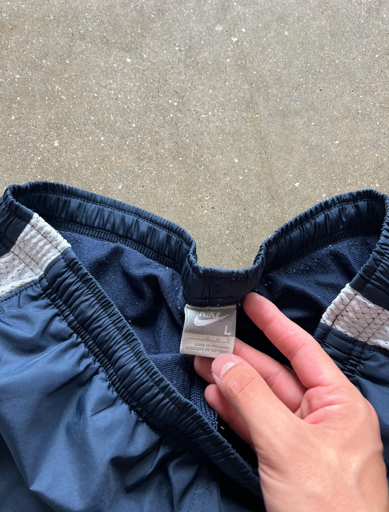 Vintage Navy Blue Nike Spellout Track Pants - L