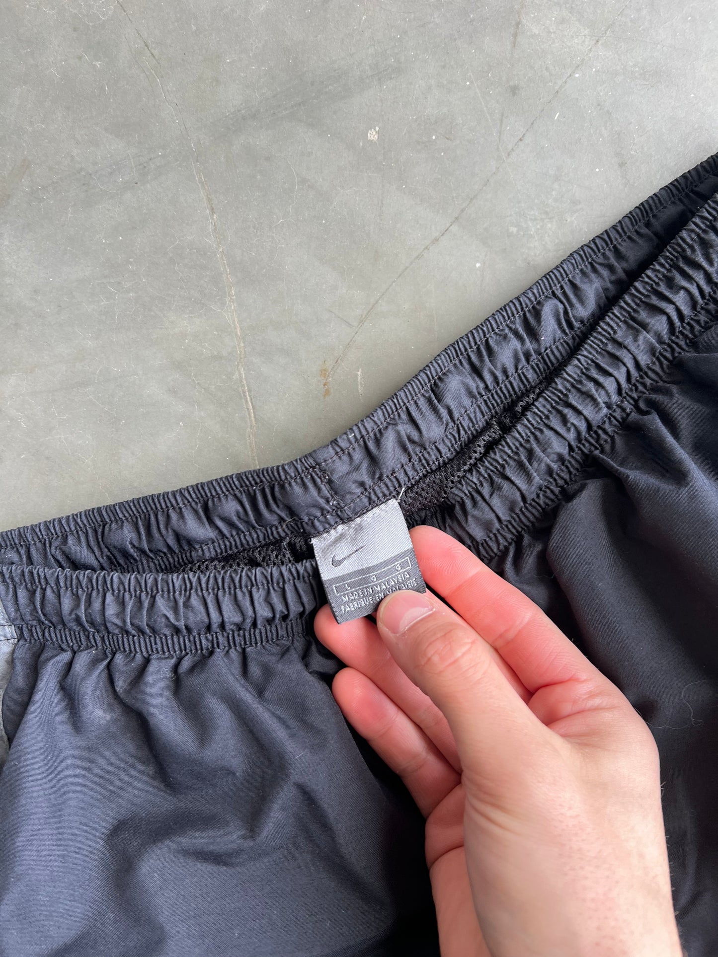 Vintage Black Nike Baggy Swoosh Track Pants - L
