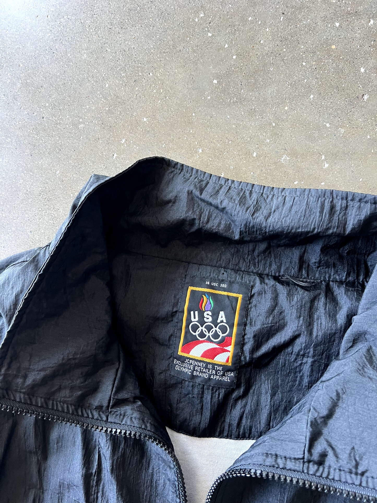 Vintage Black Olympic Windbreaker - L