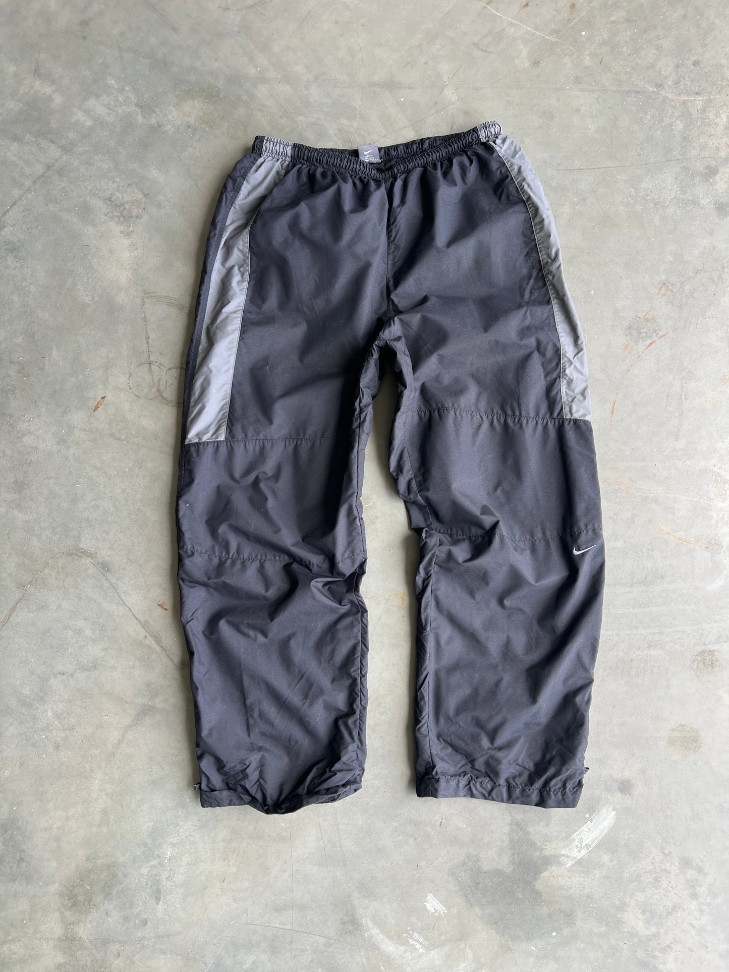 Vintage Black Nike Baggy Swoosh Track Pants - L